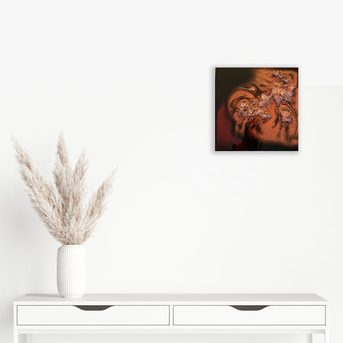 The artwork 'Study 154' by Sabrina Puppin features swirling organic patterns in rich terracotta and burnt orange tones against a dark background. The abstract composition showcases intricate glazed textures on wood, creating a dynamic interplay of light and shadow. The 12x12 inch piece exhibits fluid, coral-like formations with delicate details.