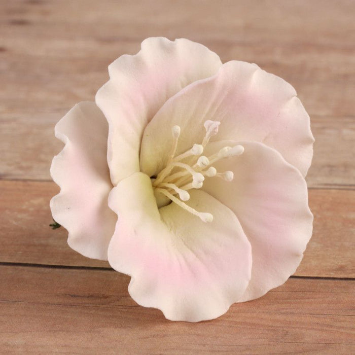 Pink Azalea Blossom cake decoration handmade from gumpaste perfect for cake decorating.  Works on rolled fondant wedding cakes and fondant birthday cakes and cupcakes.