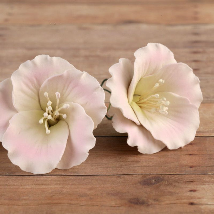 Pink Azalea blossom sugarflower made from gumpaste.  Cake decoration.  Wholesale cake supply.  Caljava Bakery Supply.