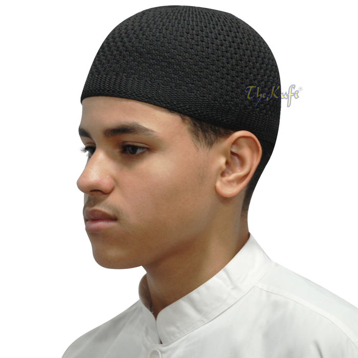 Black knitted Islamic kufi cap with a breathable mesh pattern from TheKufi.com.