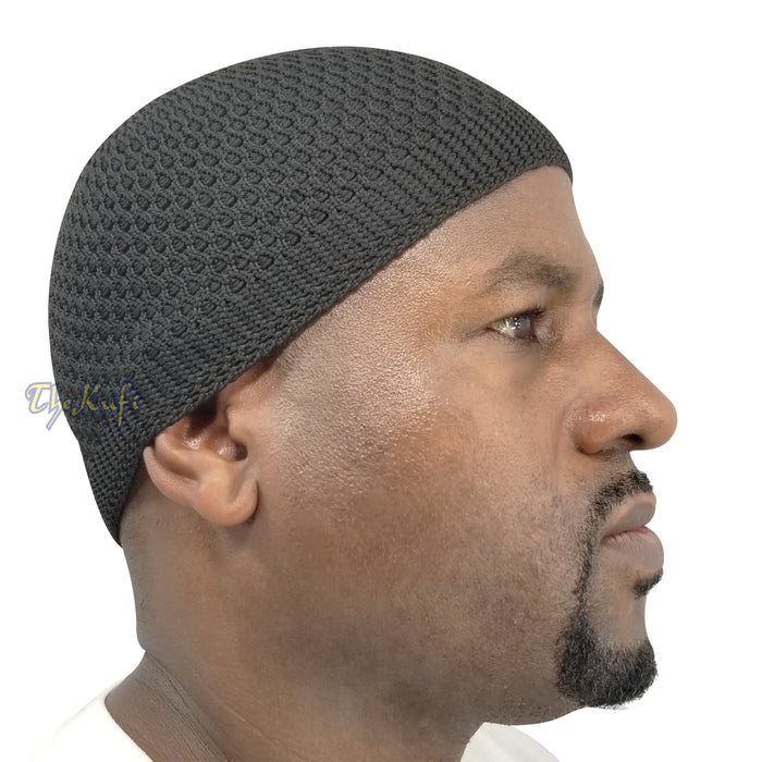 Black knitted Islamic kufi cap with a breathable mesh pattern from TheKufi.com.