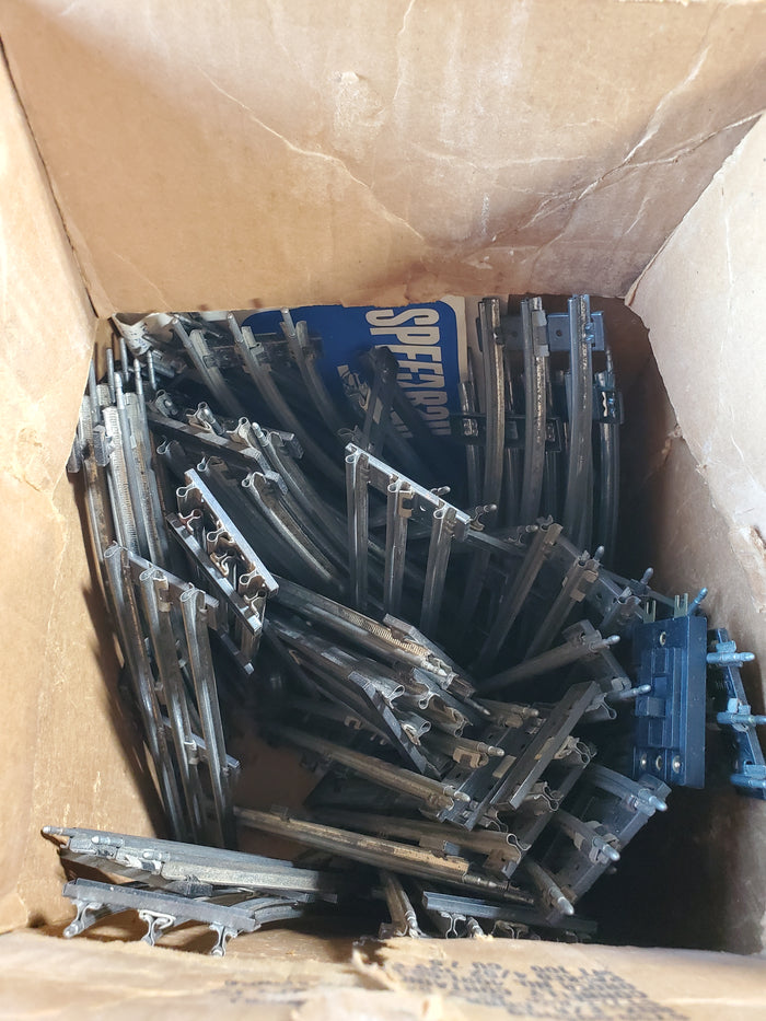 Box of Metal Model Train Tracks
