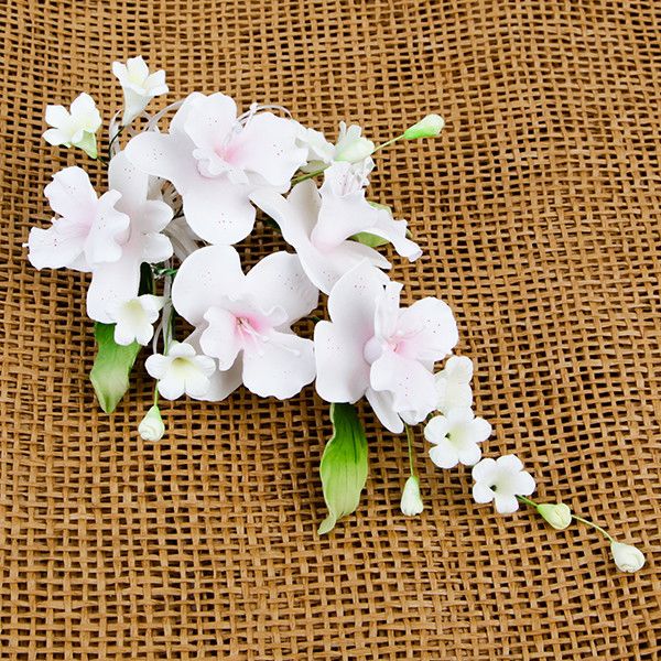 Cooktown Orchid Sprays in Pink are gumpaste sugarflower cake decorations perfect as cake toppers for cake decorating fondant cakes and wedding cakes. Caljava wholesale cake supply.