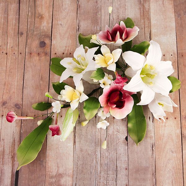 Day Lily & Phalaenopsis Large Orchid Sprays are gumpaste sugarflower cake decorations perfect as cake toppers for cake decorating fondant cakes and wedding cakes. Caljava wholesale cake supply.