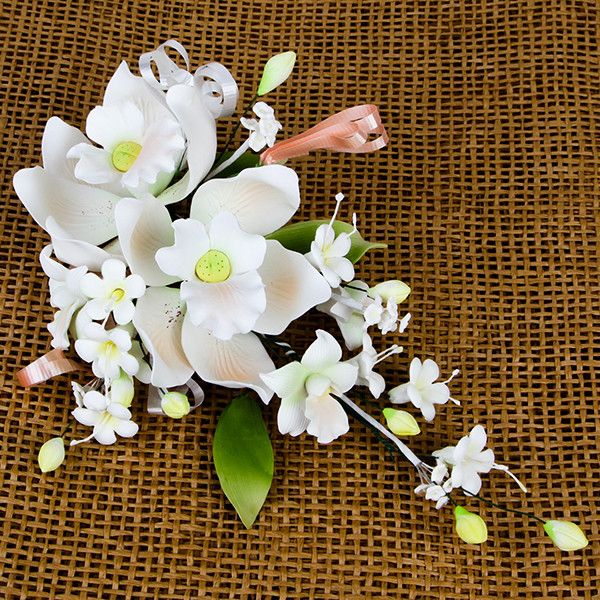 Double Tropical Orchid Sprays in Peach are gumpaste sugarflower cake decorations perfect as cake toppers for cake decorating fondant cakes and wedding cakes. Caljava wholesale cake supply.