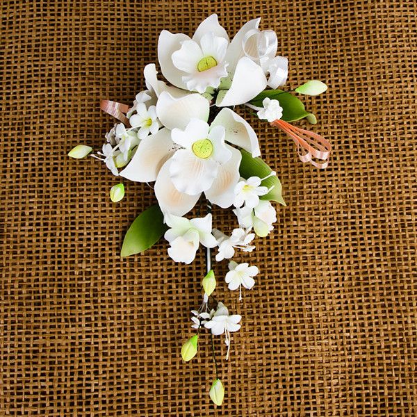 Double Tropical Orchid Sprays in Peach are gumpaste sugarflower cake decorations perfect as cake toppers for cake decorating fondant cakes and wedding cakes. Caljava wholesale cake supply.