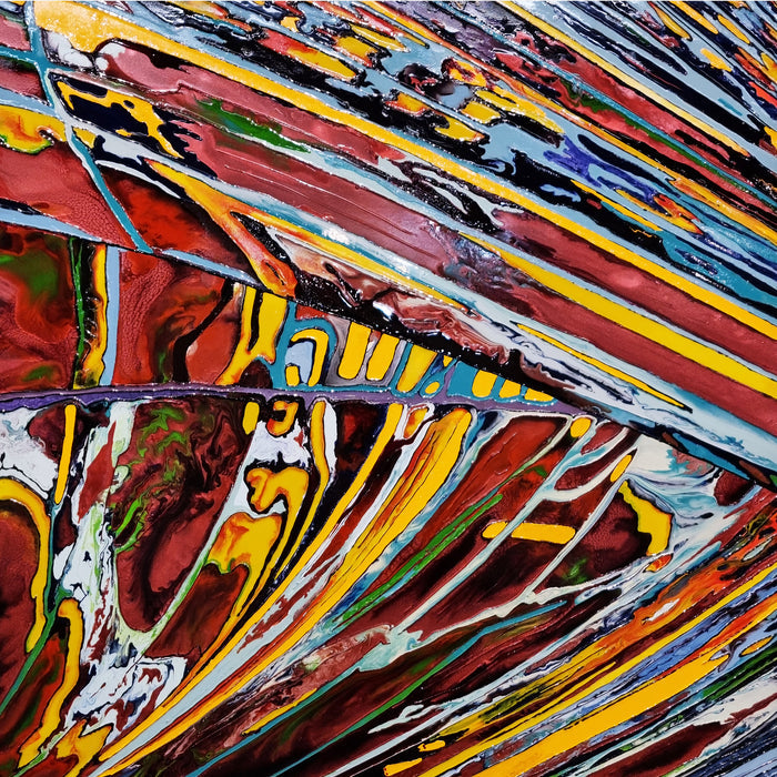 The artwork 'Flooding 2' features dynamic diagonal streaks of vibrant colors, including bold reds, yellows, and blues, created with synthetic glazes on canvas. The painting exhibits a fluid, marbled effect with intersecting lines creating a dramatic sense of movement and depth. The abstract composition suggests a rushing flow of liquid elements across the 40x40 inch canvas by Sabrina Puppin.