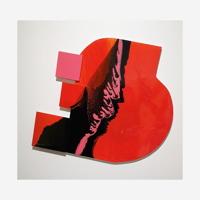 The artwork 'Is It Real or Am I Dreaming 3' features a bold geometric composition with curved edges in vibrant red, contrasting with deep black and soft pink accents. Abstract patterns created with synthetic glazes flow across the wooden surface, creating dynamic movement and texture. Contemporary wall sculpture measuring 47x55 inches by Sabrina Puppin.