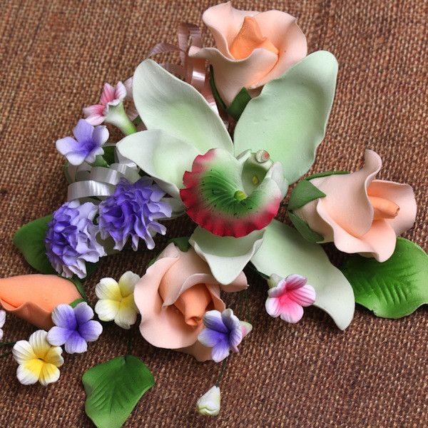 Large Cymbidium Orchid Combo Gumpaste Sugarflower Sprays perfect as a cake topper for cake decorating fondant cakes.  Wholesale Sugarflowers and cake supply. Caljava