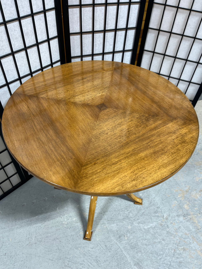 Round Wooden Occasional Table with Mid Century Flair