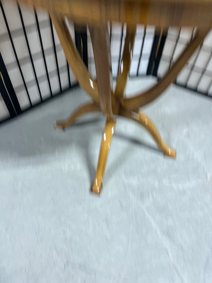 Round Wooden Occasional Table with Mid Century Flair