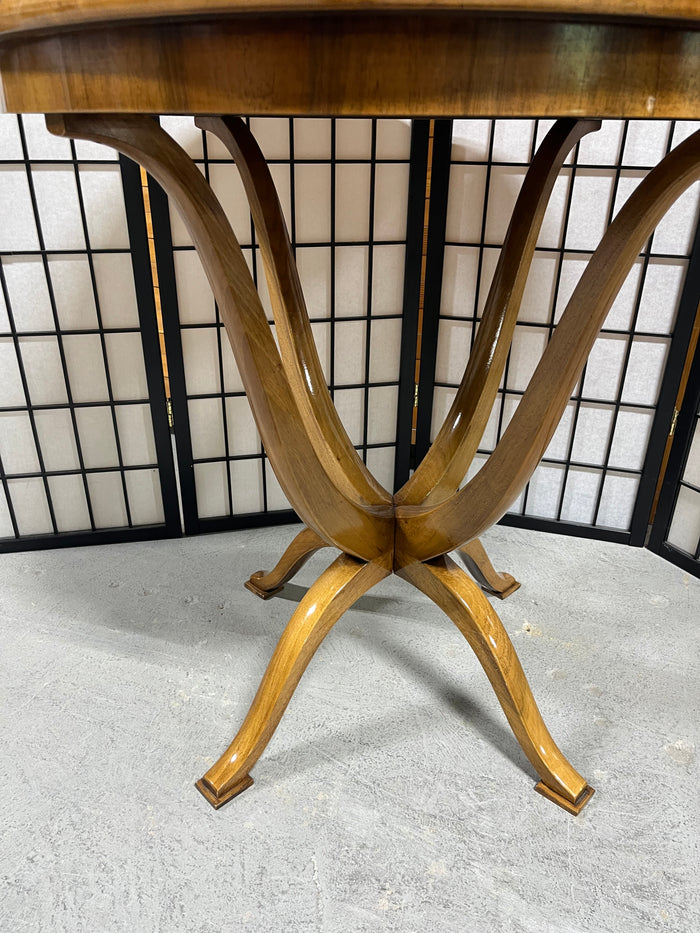 Round Wooden Occasional Table with Mid Century Flair