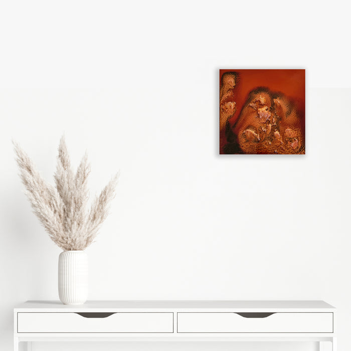 The artwork 'Study 155' by Sabrina Puppin features a striking composition of organic forms in rich burnt orange and copper tones. Abstract swirling patterns create depth and movement across the wooden surface, with textural synthetic glazes adding a luminous, almost ethereal quality. The 12x12 inch piece showcases fluid, nature-inspired shapes against a deep terracotta background.