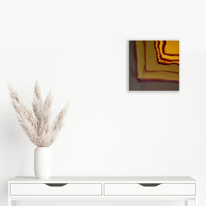 The artwork 'Study 165' by Sabrina Puppin features concentric layered curves in warm golden yellow and burgundy tones, created with synthetic glazes on wood. The abstract composition suggests topographical contours, with rich textural depth and glossy finish. The 12x12 inch piece demonstrates fluid, organic forms in a minimalist style by Sabrina Puppin.